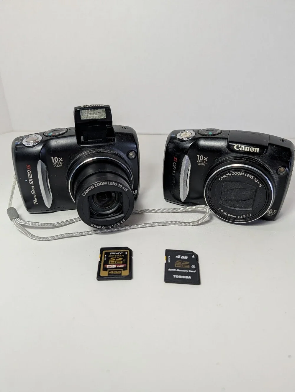 Lot Of 2 Canon PowerShot SX120 IS 10MP Digital Cameras 1 Works, 1 Parts Repair